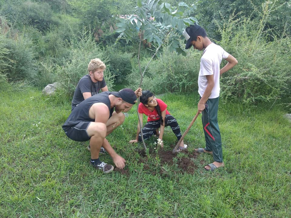 Tree planting with local youth
